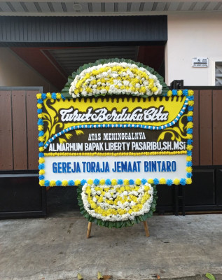 Papan Bunga Duka di Tegal S Mandala Ii